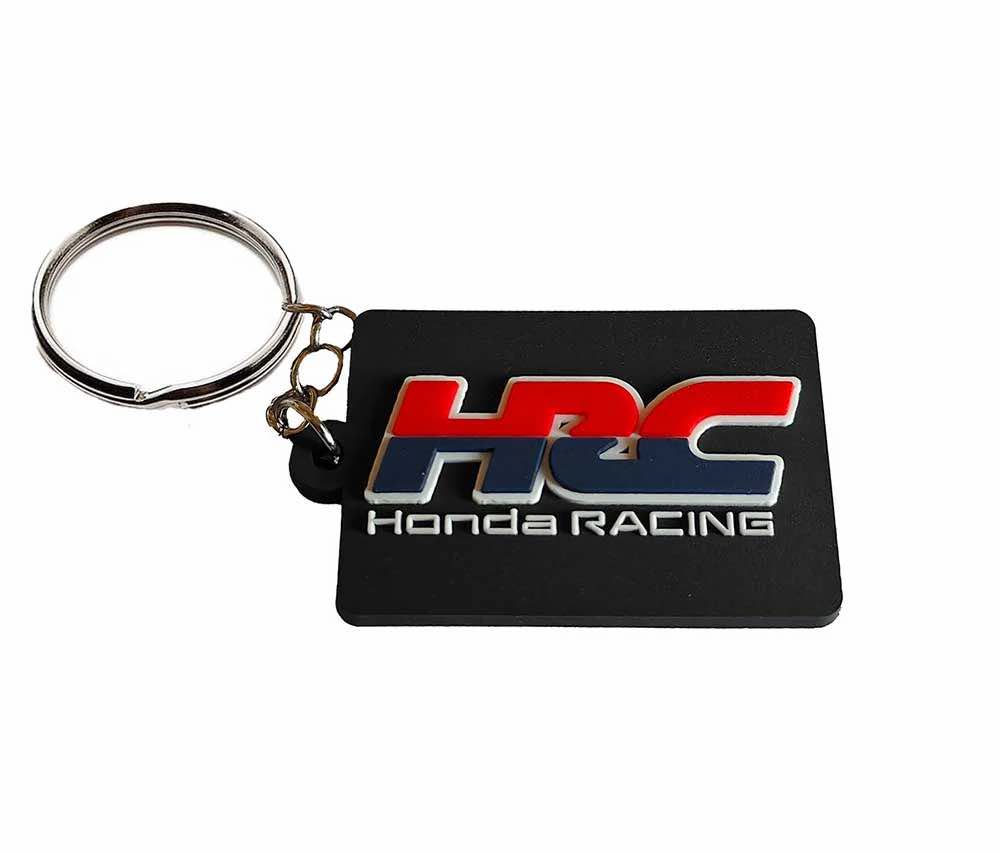 Soft rubber HRC Honda Racing keychain with raised red, white, and blue logo