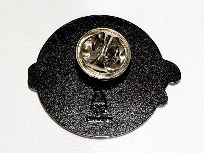 Back view of AHC Garage enamel pin with double butterfly-clutch backing