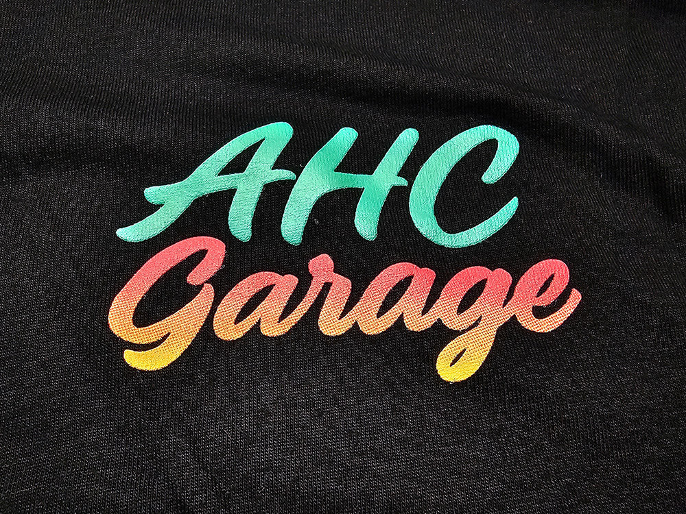 AHC Garage Never Ending Summer T-Shirt Black Front Logo Close Up View  Meet Limited Merch