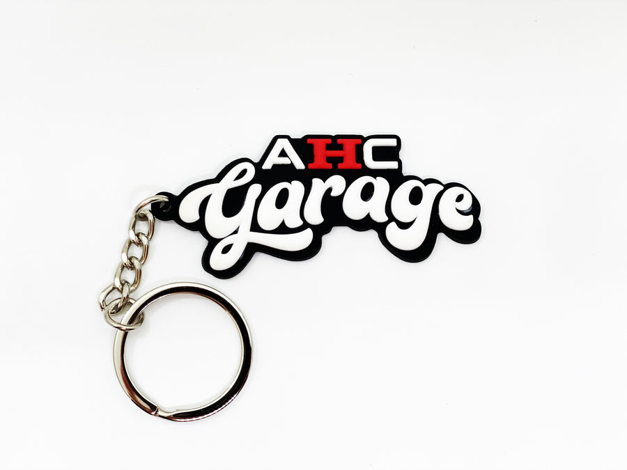AHC Garage PVC rubber logo keychain front view